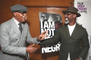 Samuel L. Jackson (who narrates "I Am Not Your Negro,") and actor Isaiah Washington greet each other during a recent screening of the film. (Photo courtesy of Magnolia Pictures)