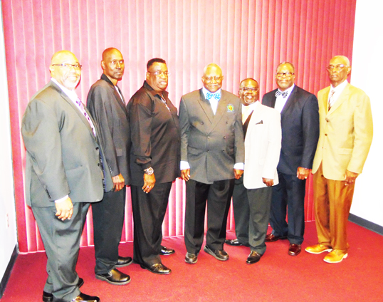 Pictured is Foundation Founder Nathanial Farley (center) surrounded by his former Stanton Class of 1978 football team members l-r: Anthony Smith, Frederick Scott, Isaac Miller, Coach Farley, Lentive Palmer, Samuel Bennefield and Dr. Jerome Wheeler. The players gathers to honor not only their former coach, but his hero as well.