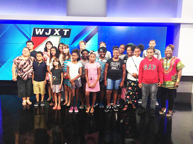 Shown touring the WJXT studios is Tristan's Pearls, staff and friends.