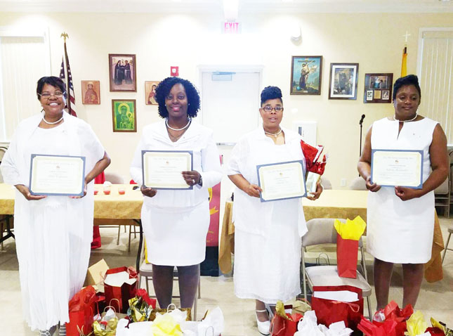 The new members inducted on May 27th are (L-R) Debi Williams, Angelus Martin-Green, Angela Lee and Sylvia Alexander