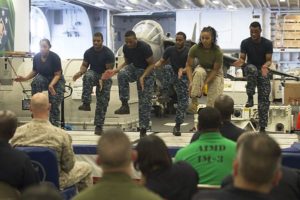 Sailors and a Marine perform a step dance during the African American and Black History Month celebration aboard the amphibious assault ship USS Makin Island (LHD 8).  The ship is deployed in the U.S. 5th Fleet area of operations in support of maritime security operations designed to reassure allies and partners, and preserve the freedom of navigation and the free flow of commerce in the region. (U.S. Navy photo by Mass Communication Specialist 3rd Class Devin M. Langer)