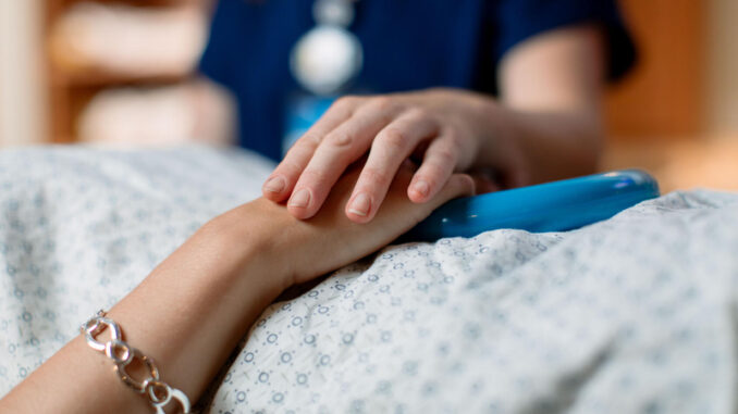 Photo of patient with Radiation tech.