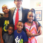 Shown with Mayor Lenny Curry with Sankofa Summer Camp/Urban Geo Phonics students Aten Abur-El, Jahhe Newsome, Kelmari Durham and Roshawn Newsome.