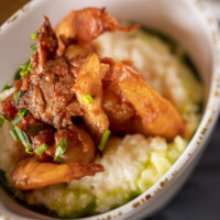 Celebrity chef and noted sChef Art Smith’s Homecomin’ restaurant scrumptious shrimp‘n grits!